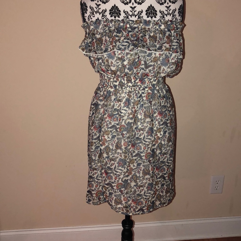 Strapless dress with paisley and flower prints.